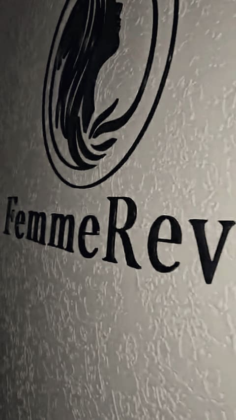 The FemmeRevive signage inside the studio