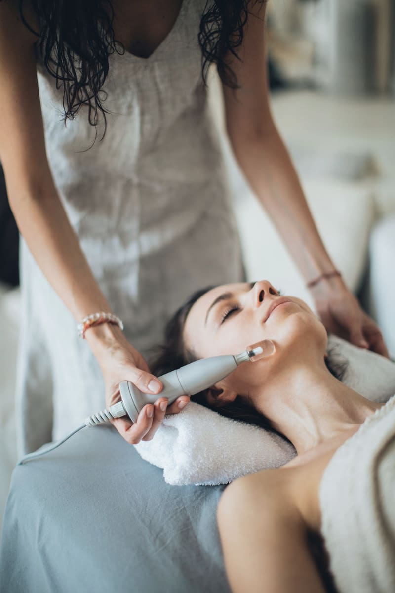 A machine-assisted facial in progress